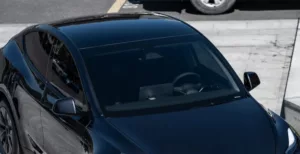 A car with TERMINAX dark window film