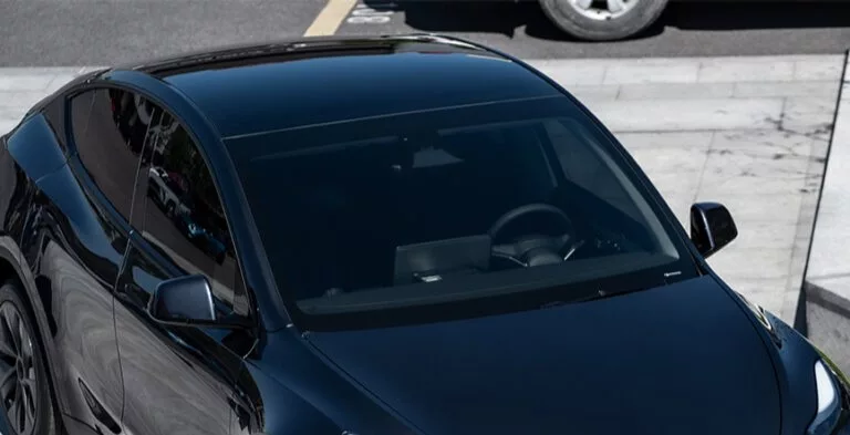 A car with TERMINAX dark window film